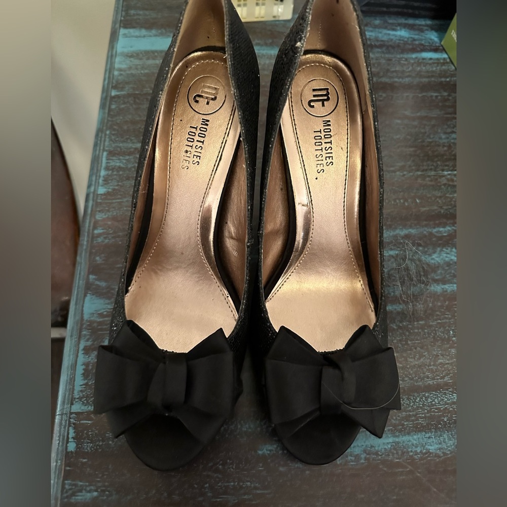 NIB. Black glitter peep toe pumps with Satin bow. Great for formals or prom